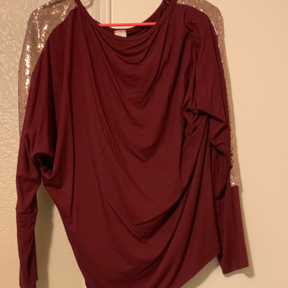 Burgundy sequin top.